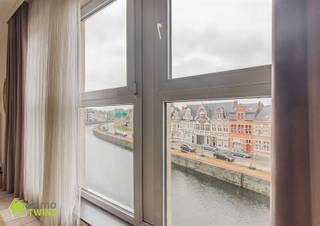 Uniek appartement met terras en adembenemend panoramisch zicht op de Oude Dender Bent u op zoek naar een instapklaar appartement met twee slaapkamers...