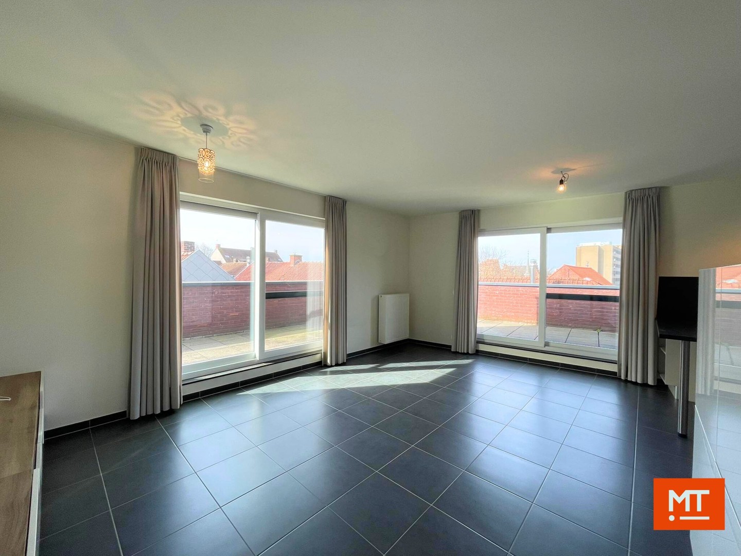 Instapklaar éénslaapkamerappartement met groot terras en ondergrondse staanplaats te huur in Izegem - foto 5