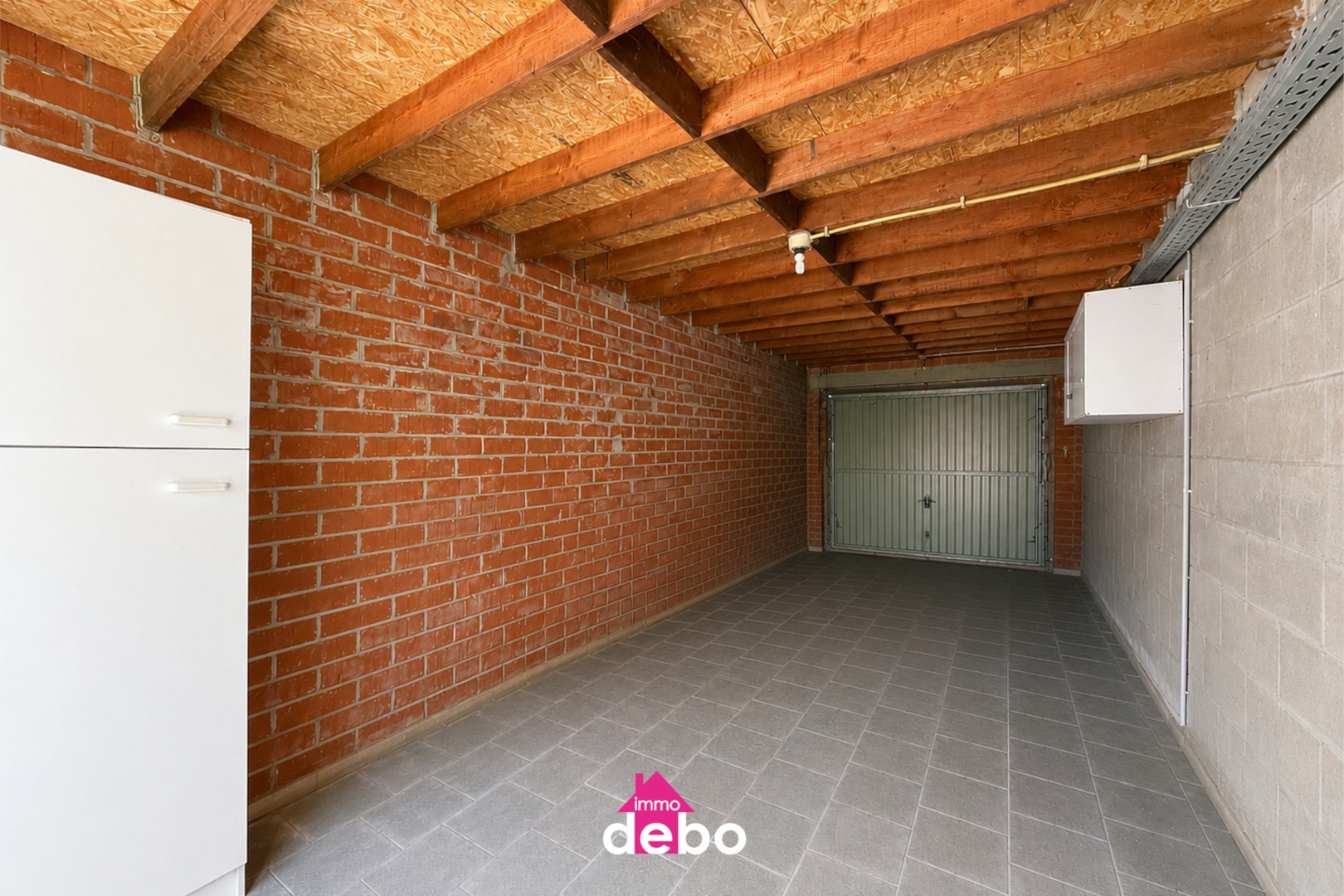 Gezinswoning met garage, 2 slaapkamers, zolder en tuin op wandelafstand van het centrum - foto 2