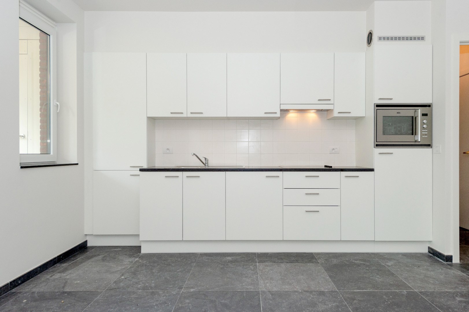 GEZELLIG APPARTEMENT IN HARTJE ROESELARE VOORZIEN VAN ALLE COMFORT! - foto 4