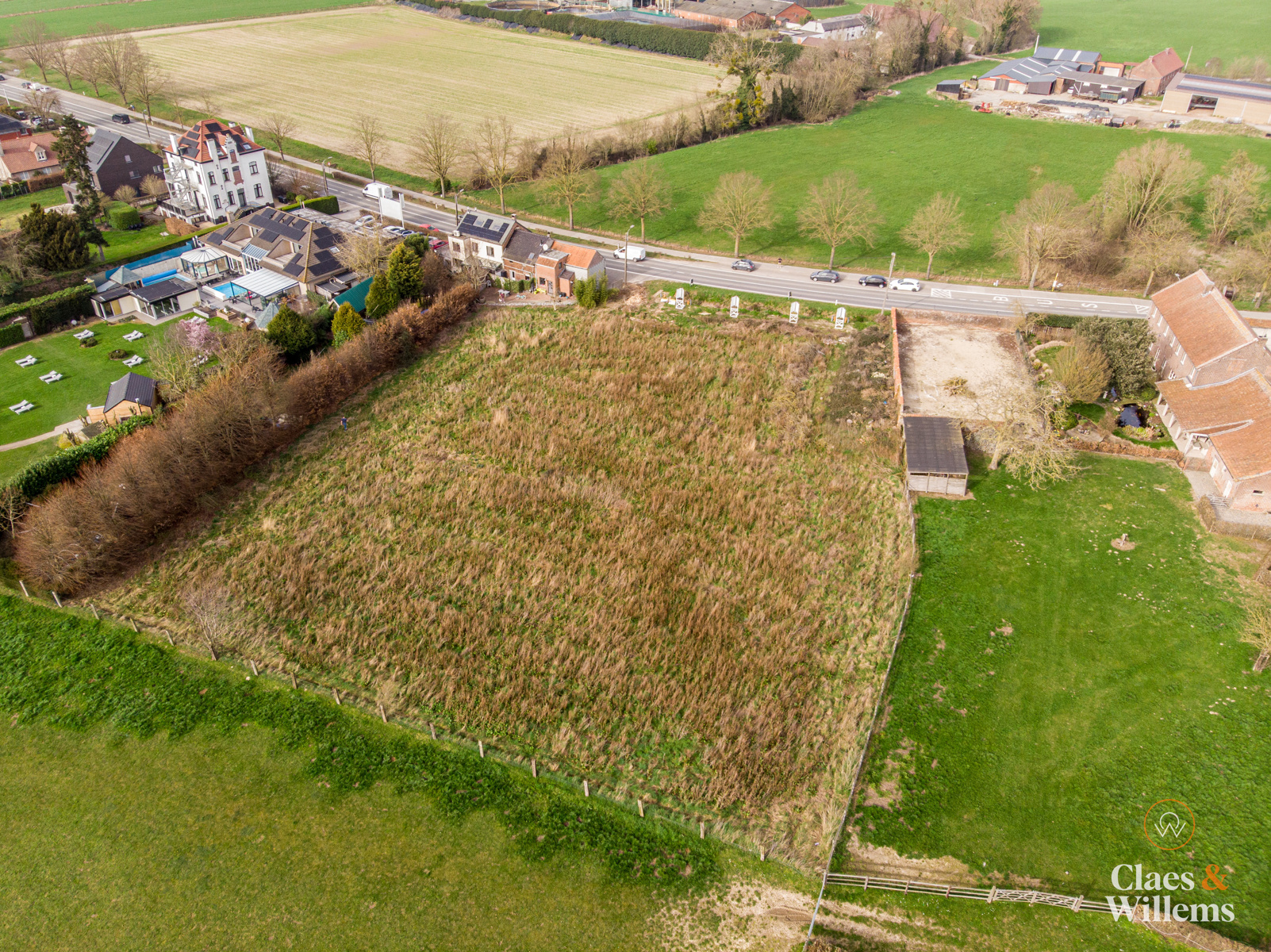 Bouwgrond voor een driegevelwoning met zuidgerichte tuin en open zicht op de velden. - foto 2