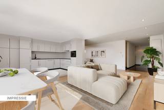 Dit topklasse appartement is gelegen in kleinschalig complex op wandelafstand van de Grote Markt. Het appartement omvat een inkomhal, riante woonkamer op parket, keuken, berging, 2 slaapkamers, badkamers met inloopdouche, bad, dubbele wastafel en toilet en een zongericht terras. In de ondergrondse garage is een garagebox. <br /><br />Indeling:<br />Via de inkomhal is er enerzijds toegang naar de leefruimtes en anderzijds naar het slaapgedeelte.<br />De woonkamer is licht, ruim en afgewerkt met een prachtige parketvloer. Aansluitend aan deze woonruimte bevindt zich een aangenaam terras met zicht op de binnentuin. De keuken beschikt over een spoel- en werkeiland en is voorzien van inbouwtoestellen zoals afwasmachine, combi-oven, koelkast met vriesvak en een keramische kookplaat. <br /><br />Het slaapgedeelte omvat 2 slaapkamers en een luxe badkamer met bad, inloopdouche, toilet, dubbele wastafel en handdoekwarmer. <br /><br />Ondergrondse garagebox optioneel bij aan te kopen aan €28.000.<br /><br />Bijzonderheden:<br />* Modern ontwerp met een prachtige architectuur. <br />* Centraal gelegen in het centrum van Turnhout<br />* Duurzame materialen en hoogwaardige kwaliteit <br />* Binnentuin met waterpartij<br />* Luxe en rust in het centrum van de stad!<br />* Conforme elektrische keuring