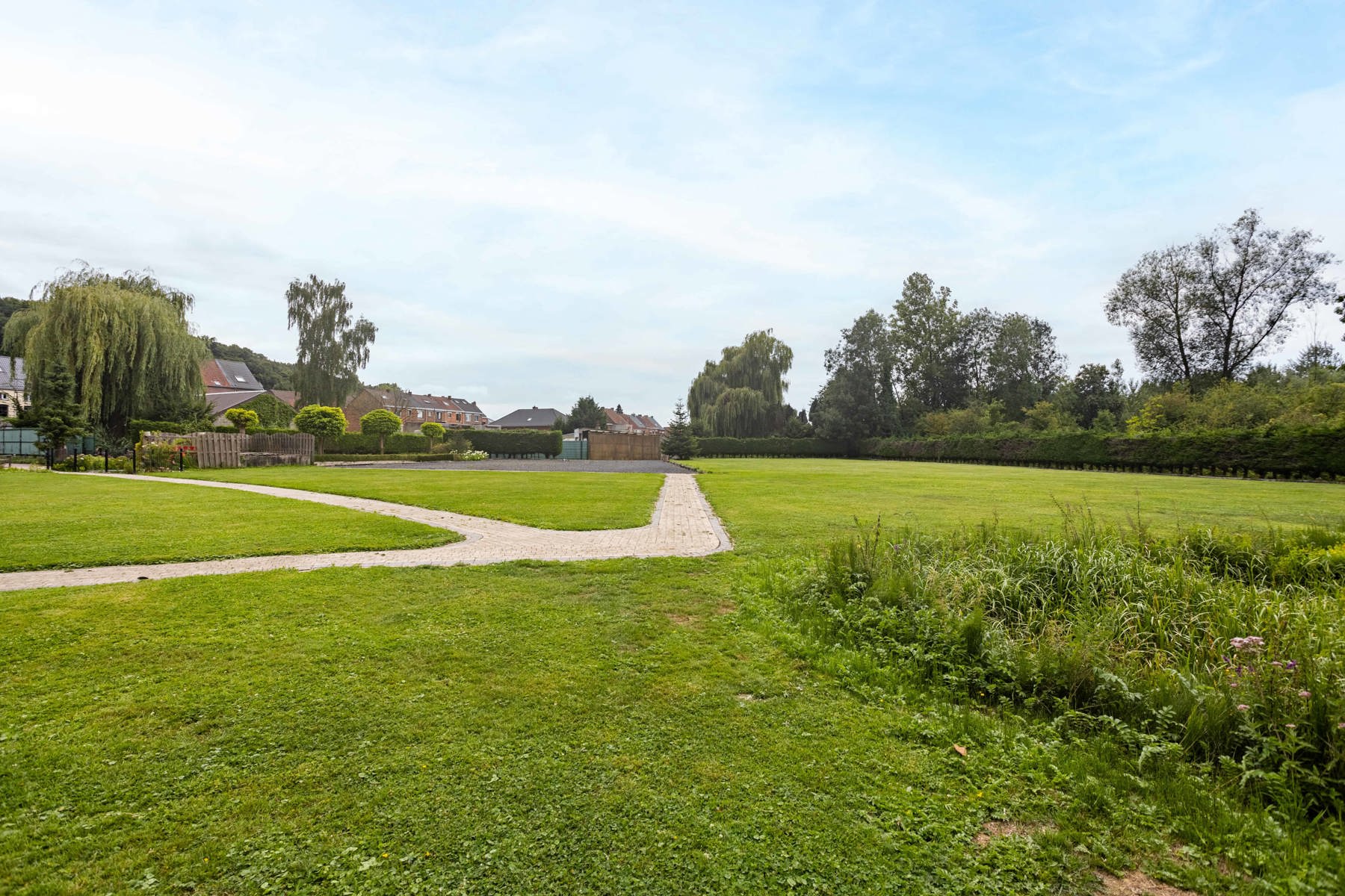 Handelswoning met ruime parking en prachtige parktuin - foto 4