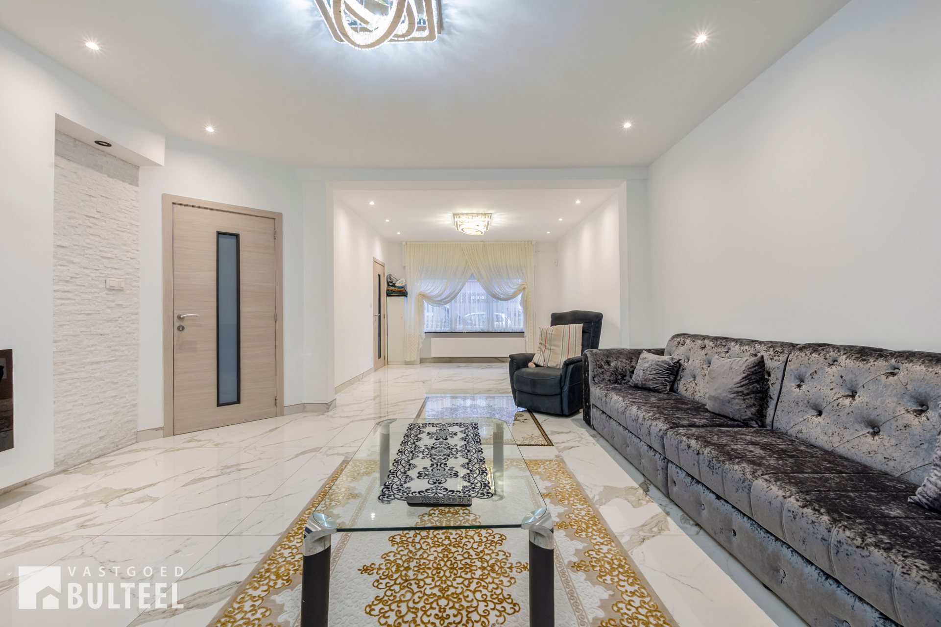 Zeer ruime en instapklare woning met 4 slaapkamers en tuin. - foto 5