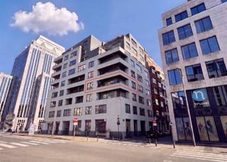 <p><span><span>This recently renovated and move-in-ready corner apartment is located on the third floor of the Jacqmain residence (built in 2008), ideally situated on Emile Jacqmainlaan in the heart of Brussels. Thanks to its excellent location, Rue Neuve, Rogier metro station, the Manhattan Center and the Grand-Place are all within walking distance. With a living area of 64 m², the apartment comprises an entrance hall with a separate guest toilet, a bright living room with a fully equipped open-plan kitchen, a spacious master bedroom and a modern bathroom with bathtub and vanity unit. A major asset is the beautiful 10 m² south-west facing corner terrace, ideal for enjoying the afternoon and evening sun! The recent renovation and high-quality finishes provide modern living comfort. The apartment is currently rented out, making it an interesting opportunity for investors looking for a property generating immediate rental income. The property also offers excellent accessibility thanks to its proximity to the Brussels Ring Road and the E40 and E19 motorways. Cellar no. 25 is included in the sale price. This property also offers an attractive option for owner-occupation, combining comfort, a central location and valuable outdoor space. For more information or to arrange a first viewing, please contact Frederik at </span></span><span>frederik@immo-time.be</span><span><span>.</span></span></p>