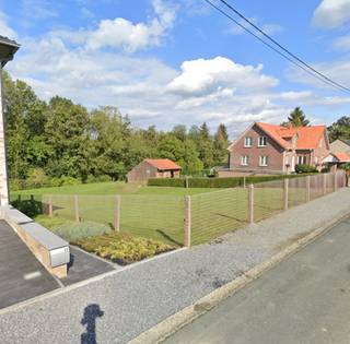 Bouwgrond van 12,70 Are in groene omgeving nabij het Centrum van Huldenberg = IN OPTIE.Bent u op zoek naar een bouwgrond voor een open bebouwing in...