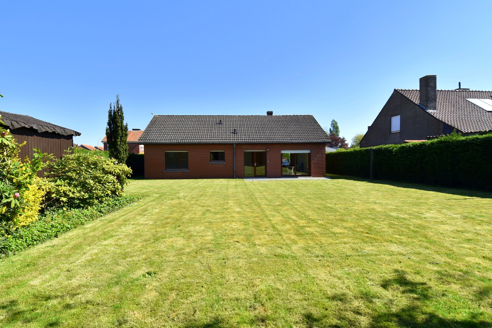 Ruime alleenstaande woning met 2 slaapkamers (mogelijkheid tot meer!), garage en zonnige tuin te koop in Gullegem - foto 4