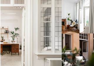 <p>In the heart of Antwerp’s beloved historic center, behind a characterful façade, lies a unique city residence bursting with potential. Thanks to its versatile layout and an impressive usable surface of no less than 360 m², this property offers countless possibilities. Moreover, it is only a stone’s throw away from the Grote Markt, the Cathedral of Our Lady, and the Hendrik Conscienceplein — all renowned and cherished for their boutiques, museums, and popular hotspots.</p>
<p>While careful renovation works have been carried out with a view to modern living comfort, the soul and authenticity of this house have been beautifully preserved. High ceilings, large windows, fireplaces, and original wooden floors immediately catch the eye, radiating style, class, and timeless elegance.</p>
<p>The ground floor can still be completely tailored to your wishes, with its impressive halls, kitchenette, sanitary facilities, and cellar. Think of a gallery, studio, event space, or professional practice — the possibilities are endless.</p>
<p>On the first floor, you will find a spacious, sunlit lounge with an adjoining trendy open kitchen and an idyllic terrace. A discreet spot to unwind, right in the beating heart of the city. This level also houses a multifunctional space and a stylish bathroom with a walk-in shower. The second floor comprises two master bedrooms, each with an ensuite bathroom, one of which is additionally fitted with its own kitchenette.</p>
<p>The first and second floors are currently successfully rented out short-term via Airbnb &amp; Booking.com, generating an attractive return of 7% — approx. €80,000/year.</p>
<p><strong>Technical details:</strong> central gas heating with condensing boiler, mainly single and double wooden glazing.</p>
<p><strong>Town planning information and soil certificate available.</strong> Not asbestos-safe. Not located in a flood risk zone (P- and G-score A). Renovation obligation not applicable.</p>