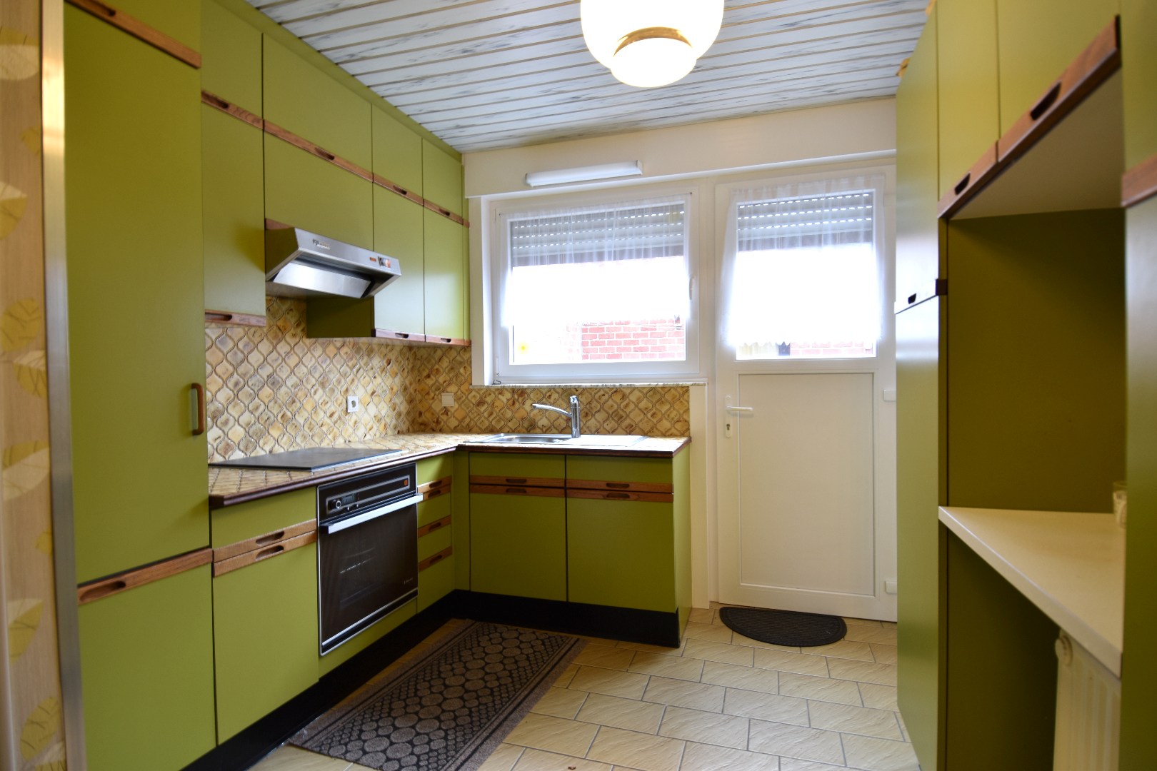 Woning op hoekperceel met 3 slaapkamers, garage en zalige tuin te koop in Gullegem - foto 4