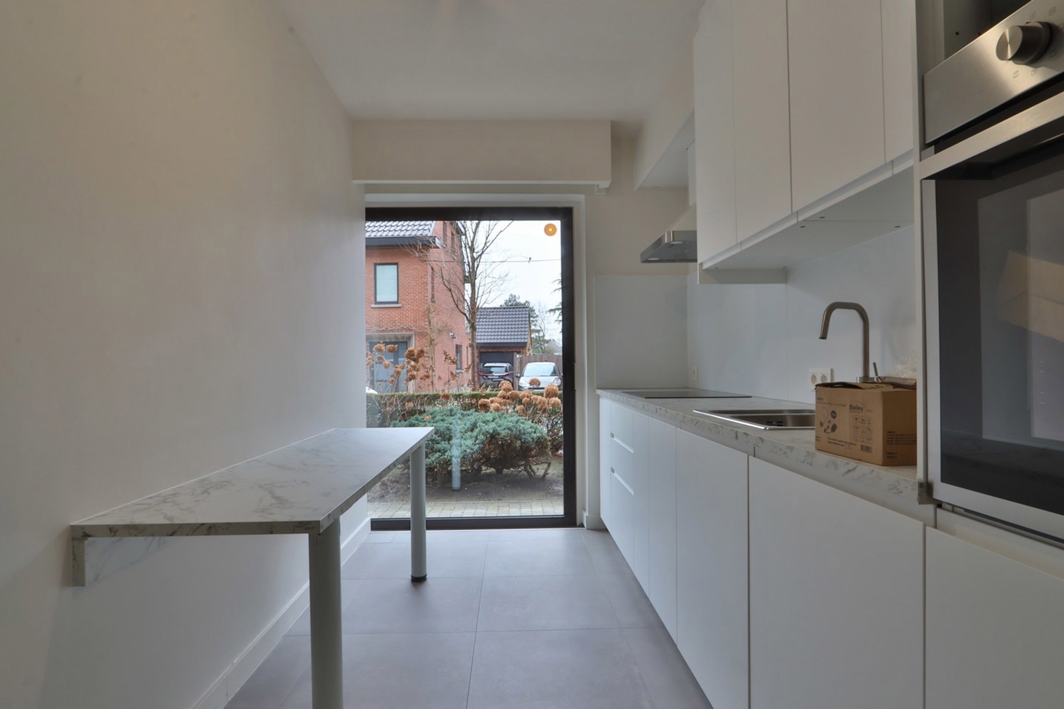 Gelijkvloers 2-slpk app. met garage nabij centrum Beveren - foto 4