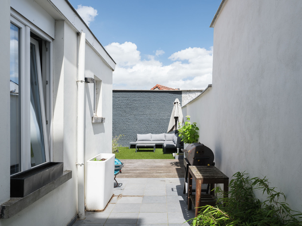 Karaktervolle burgerwoning met 4 slaapkamers en aangename stadstuin op een boogscheut van het stadscentrum. - photo 4