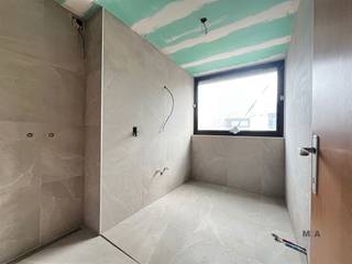 Goed gelegen appartement-building, centrum Zonhoven. 3 Slaapkamers en een mooi zongericht terras. Garagebox inbegrepen, bereikbaar via...