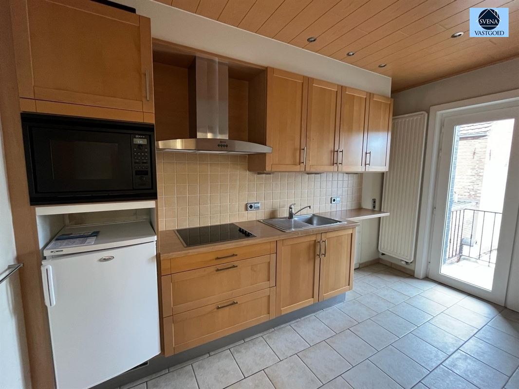 HANDELSHUIS EN APPARTEMENT MET 5 SLAAPKAMERS - foto 5