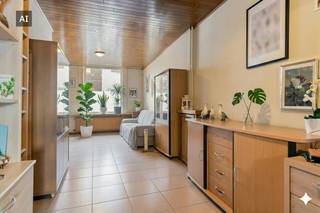 Welkom in deze gezellige gezinswoning nabij het centrum van Izegem. Achter deze gevel schuilt een verrassend ruime en verzorgde woning. De woning werd opgetrokken in 1930 en gerenoveerd in 2017, waarbij comfort en functionaliteit centraal staan. Met een bewoonbare oppervlakte van 151 m² en 3 volwaardige slaapkamers biedt deze woning alle ruimte voor aangenaam gezinswonen nabij het centrum van Izegem.Indeling van het huis:KelderGelijkvloers- Eetkamer- Keuken- lichtrijke leefruimte - Aangelegd terras met apart toiletEerste verdieping- Badkamer- SlaapkamerTweede verdieping- 2 slaapkamersZolderTroeven van het huis:- Instapklaar karakter- Interessante investeringsvastgoed- Centrale ligging nabij belangrijke verbindingswegen en het centrum van IzegemDeze AI-visualisaties zijn bedoeld als inspiratie. Er werd geen rekening gehouden met technische specificaties, stedenbouwkundige voorschriften of de concrete mogelijkheden tot realisatie.Heb je interesse in dit huis te Izegem? Neem dan vandaag nog contact op met de dossierverantwoordelijke Pierre Dubuisson pierre.dubuisson@dewaele.com - 0477 56 02 10.Deze AI-visualisaties zijn bedoeld als inspiratie. Er werd geen rekening gehouden met technische specificaties, stedenbouwkundige voorschriften of de concrete mogelijkheden tot realisatie.