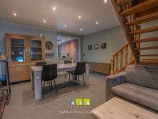 Verrassend ruime woning, gelegen op een ruim perceel van 13a15ca te Rotem. <br /><br />EPC: 398kWh/m². UC: 0000314979.<br /><br />TROEVEN:<br />- Laag beschrijf mogelijk<br />- Inpandige garage<br />- Uitbreidingsmogelijkheden<br /><br /><br />INDELING: <br />KELDER: Onder de woonkamer is een gedeelte kelder.<br /><br />GELIJKVLOERS 00: Inkomhal, ruime woonkamer met houtkachel en open trap naar het verdiep. Half open keuken met kasten boven en onder met inbouwtoestellen (inox afwasbak, electrisch vuur, dampkap, koelkast, afwasmachine. ), in de keuken is plaats voor een tafel. De schuifraam in de open keuken geeft uit op het terras. <br />Vernieuwde badkamer met bad/douche badkamermeubel met wasbak, spiegel, inbouwspotjes, toilet . Berging/wasplaats met aansluiting voor wasmachine.<br /><br />VERDIEPING +01: overloop, 3 slaapkamers, <br /><br />ZOLDER: Via een luik in de nachthal is er toegang tot de zolder.<br /><br />EXTERIEUR: achter de woning situeert zich een terras en de ruime tuin met achterliggende weide. In deze weide ligt een gemetste stal van 42m². De weide is eveneens langs achteren bereikbaar. Naast de woning bevindt zich een garage. Boven deze garage is nog een bergzolder.<br /><br />INFOPLICHT: Vg-Wg/ag-Gdv-Gvkr-Gvv. Meer info: 089/86.18.88 of www.N78vastgoed.be<br />