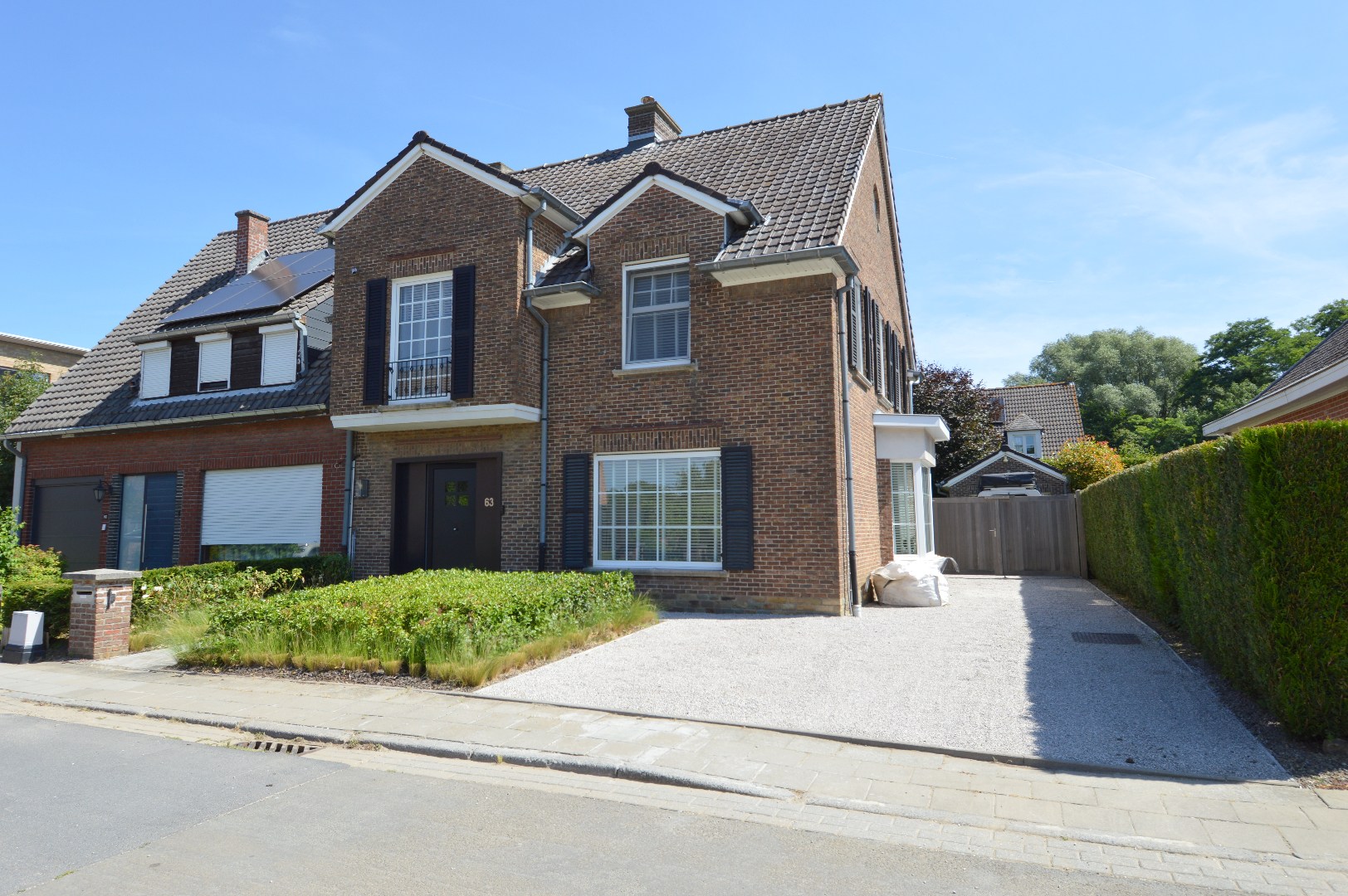 Halfopen woning met tuin, garage en 3 slaapkamers te Wevelgem - foto 1