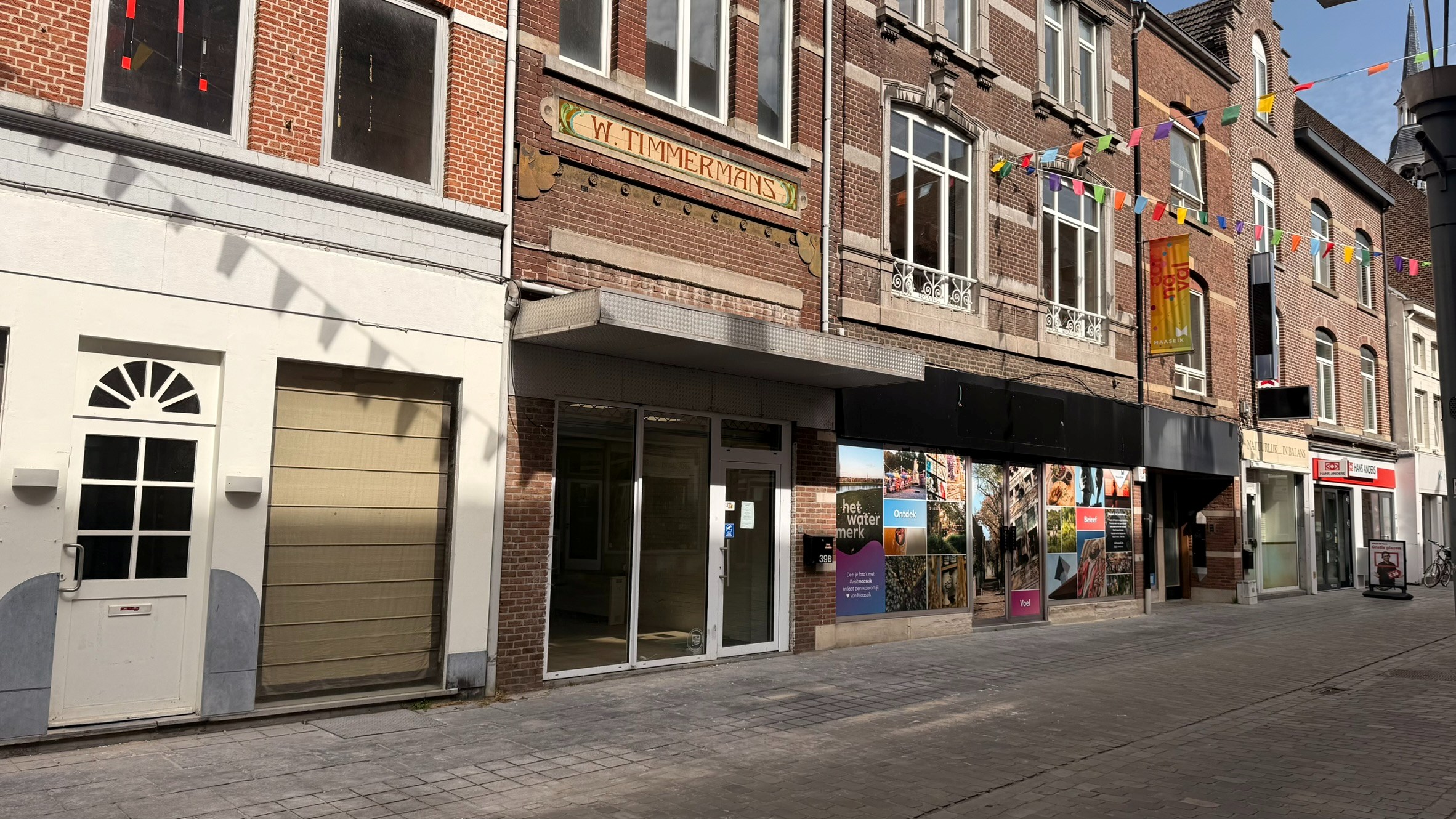 Goed gelegen duplex handelspand in hart van Maaseik - foto 2