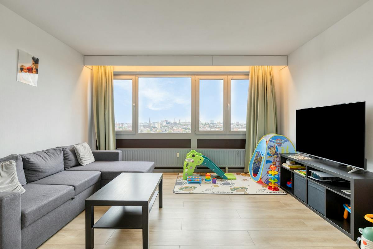 Appartement prêt à emménager au 13e étage à Borgerhout ! - photo 2