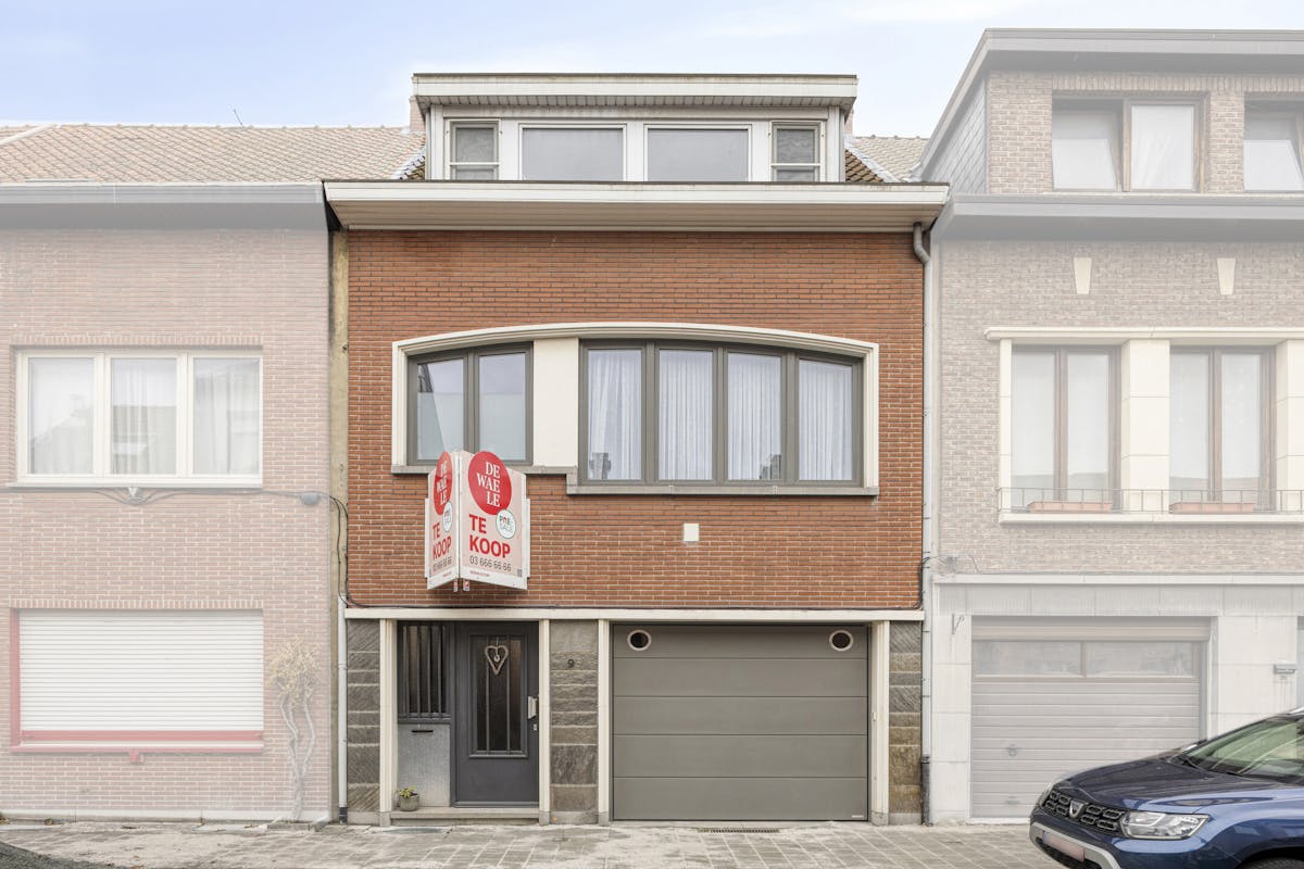 Ruim huis te koop Merksem met garage en zonnige tuin - foto 1