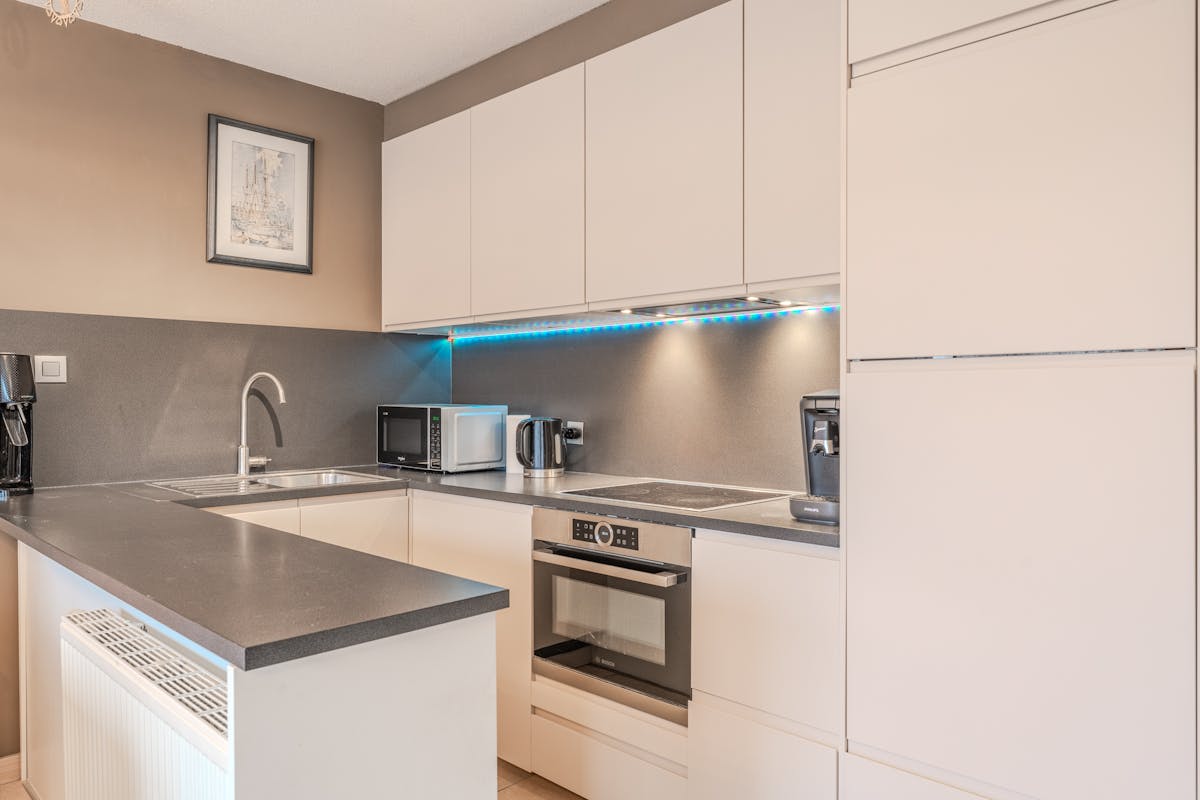Instapklare rijwoning met zonnige tuin te Oostende - foto 5