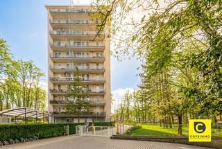<p><span>Recently renovated 2 bedroom apartment with terrace in 't green!</span></p><p><span>This stylishly renovated apartment with sublime finish is located on the</span><span><sup>8th</sup></span><span> floor of an excellently maintained building with prime location. Stores, parks, schools, restaurants, sports facilities, public transport and approach roads are always nearby, as well as the vibrant Antwerp city life. Also structurally this gem is a real winner, you enjoy an excellent EPC A, compliant electricity and it is asbestos safe. From every room you overlook the surrounding natural beauty, your privacy is 100% guaranteed. In short, a guarantee of quality and carefree living and / or investment.</span></p><p><span> </span></p><p><span>Entrance hall, living space & kitchen:</span></p><p><span>The outstanding finish is immediately apparent when entering the apartment through the entrance hall with security door, videophone and beautiful natural oak parquet that continues seamlessly into the living space and perfectly matches the travertine tiled floor of kitchen, bathroom and toilet. The line also continues into the light-filled living space that overlooks the greenery and features designer light rails. The eye-catching walnut kitchen with cooking island and seating area is the vibrant heart and is equipped with quality appliances (induction cooktop with integrated recovery hood, refrigerator, freezer, dishwasher). The recessed LED lighting literally and figuratively puts this sublime kitchen in the spotlight and you also enjoy a 5-year warranty on appliances and 10 years on cabinets. </span></p><p><span> </span></p><p><span>Night hall, laundry room, toilet, bathroom & bedrooms:</span></p><p><span>The separate laundry room was subtly integrated into the night hall and the toilet was also housed separately. The rustic bathroom includes a fantastic walk-in/rain shower and a modern double washbasin. A place with a high Zen content where you can completely unwind. Both bedrooms are spacious, also on parquet and overlooking the greenery, a good night's sleep is assured. From the spacious master bedroom, by the way, you have direct access to the terrace. </span></p><p><span> </span></p><p><span>Terrace, basement, car parking & bike storage:</span></p><p><span>The extensive (south)west-oriented terrace extends the entire width of the apartment. Here you can fully enjoy the green surroundings, whether or not accompanied by a good glass of wine or a tasty meal. The basement storage room is included. The above-ground car parking space must be purchased (€ 7,500). Bicycles can be stored both underground and above ground.</span></p><p><span> </span></p><p><span>Additional assets:</span></p><p><span>- Prime location</span></p><p><span>- Move in, unpack and enjoy</span></p><p><span>- EPC A (92m²)</span></p><p><span>- Electricity compliant</span></p><p><span>- Asbestos safe</span></p><p><span>- New HR windows and radiators</span></p><p><span>- High level of finishing</span></p><p><span>- Large (S)W terrace</span></p><p><span>- Condition of the building (recent terraces, roof and facade insulation/renovation, elevator, side paths, sewerage,...)</span></p><p><span>- Basement, bike storage and car parking area</span></p><p><span> </span></p>