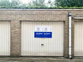 garagebox 16, gelegen achteraan het appartementsgebouw