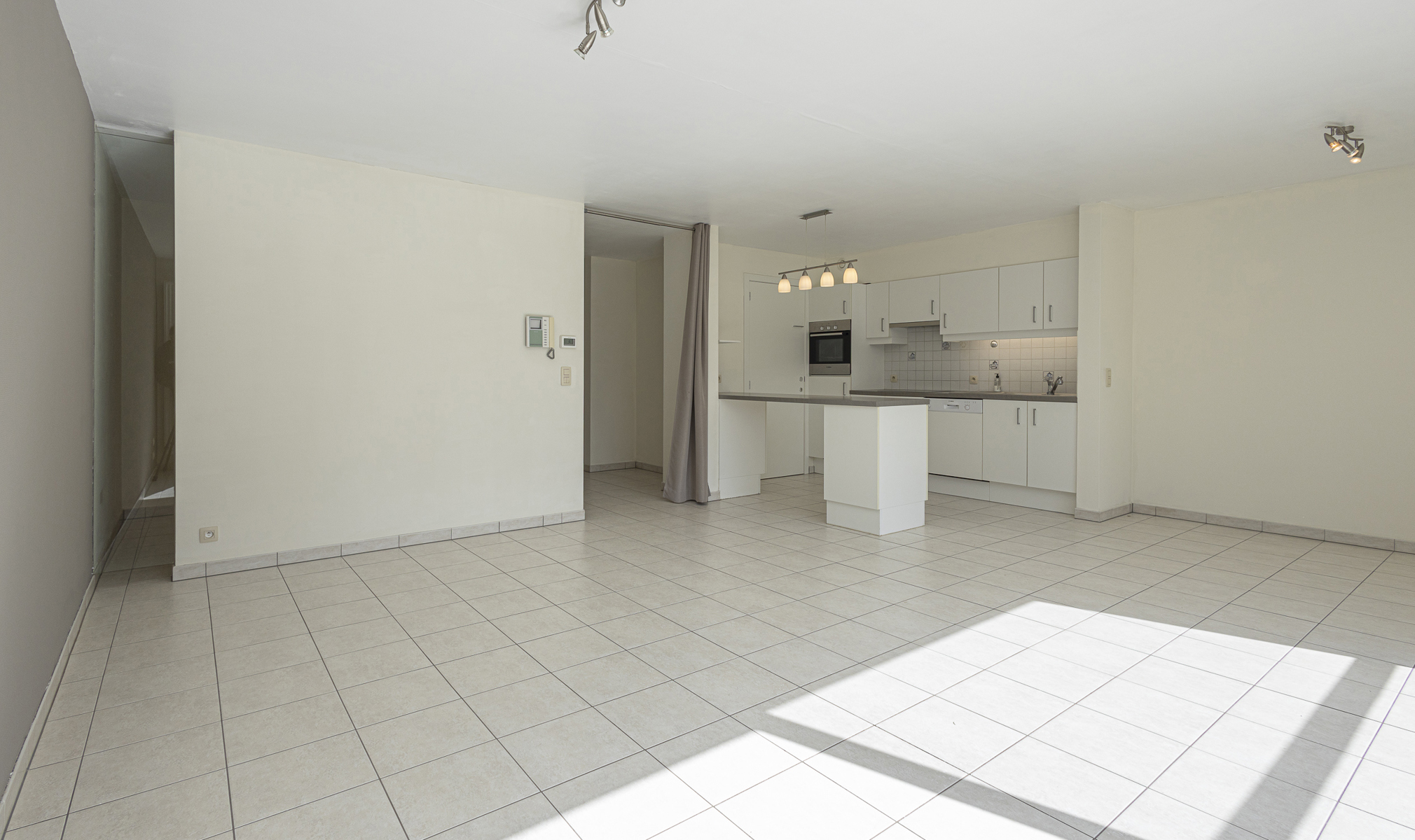 Recent gelijkvloers appartement met tuin en autostaanplaats - foto 5