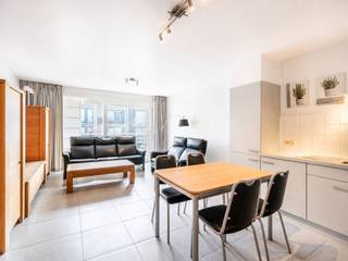 Don’t miss this opportunity: A move-in-ready apartment with a side view of the sea in a prime location in Koksijde!<br /><br />Located on the second floor of the well-maintained Santos Secundo residence (built in 2011), this move-in-ready apartment boasts an excellent location. The sea is literally just around the corner, the Schipgat Dunes serve as your green backyard, and the lively center of Koksijde is just a few minutes’ walk away. The ideal base for anyone looking for a carefree second home on the Belgian coast.<br /><br />Layout:<br />Spacious entry hall | bright living area with a fully equipped open kitchen | sunny balcony with a side view of the sea | bathroom with a bathtub and vanity | separate guest restroom with a sink | first bedroom with bunk beds | spacious second bedroom with access to the rear balcony.<br /><br />Are you looking for a move-in-ready apartment in a prime location, close to the sea, the dunes, and downtown? Contact us today for more information or to schedule a visit.