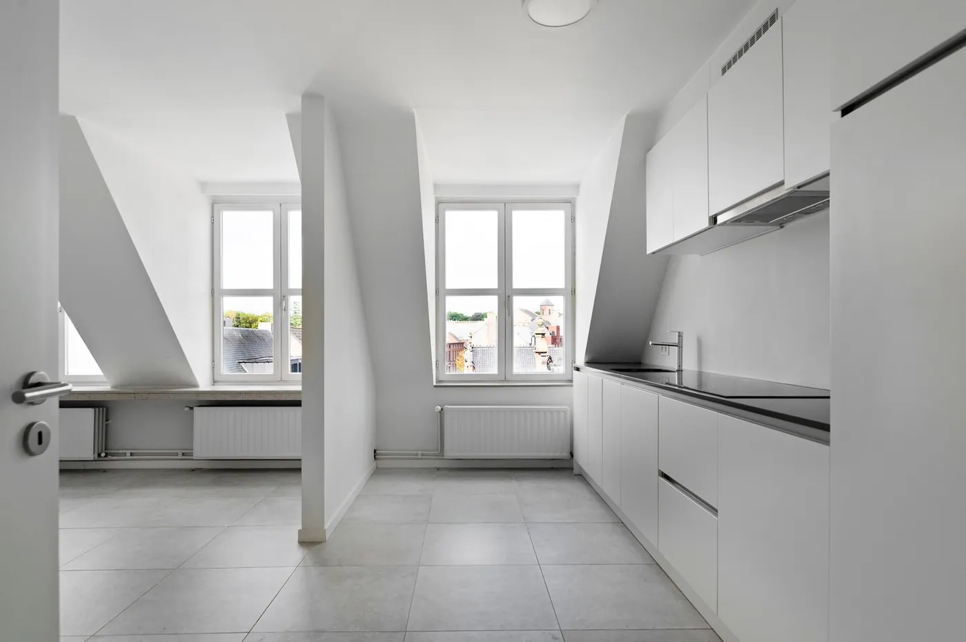 Lichtrijk, instapklaar dakappartement met 2 slaapkamers nabij het Zimmerplein in Lier! - foto 4