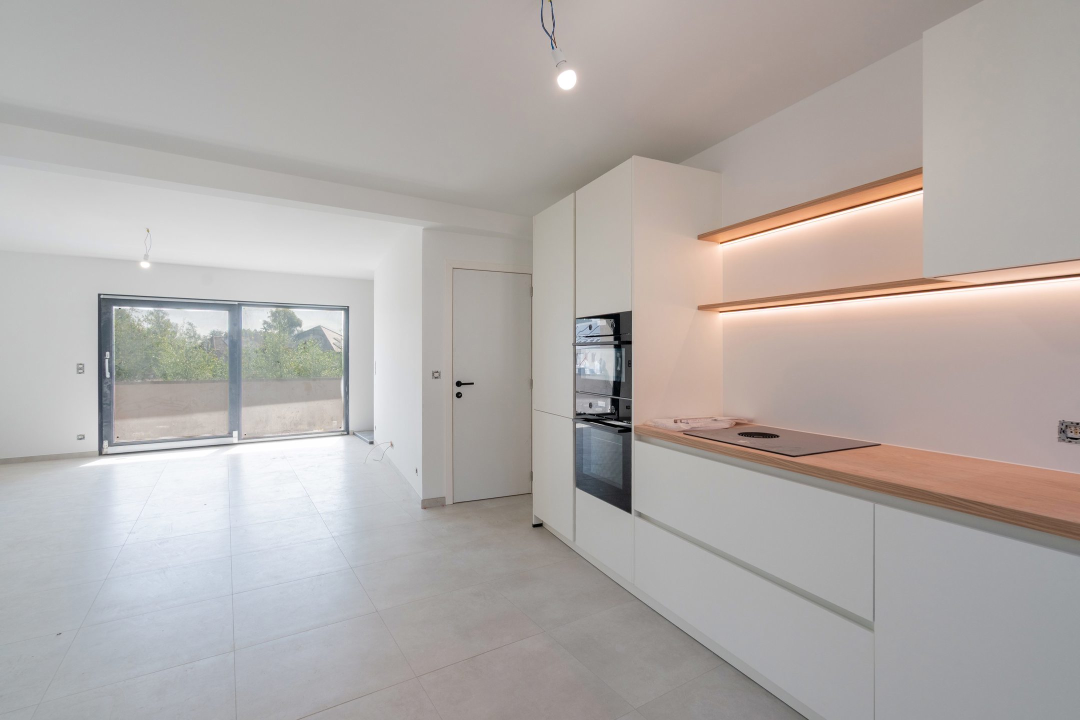 Energiezuinige duplex met terras en staanplaats - foto 1