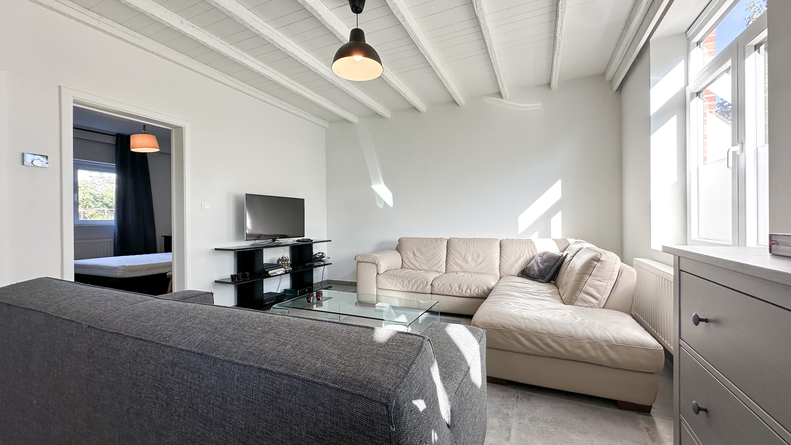 Charmante woning met 2 slaapkamers en een polyvalente ruimte - foto 5