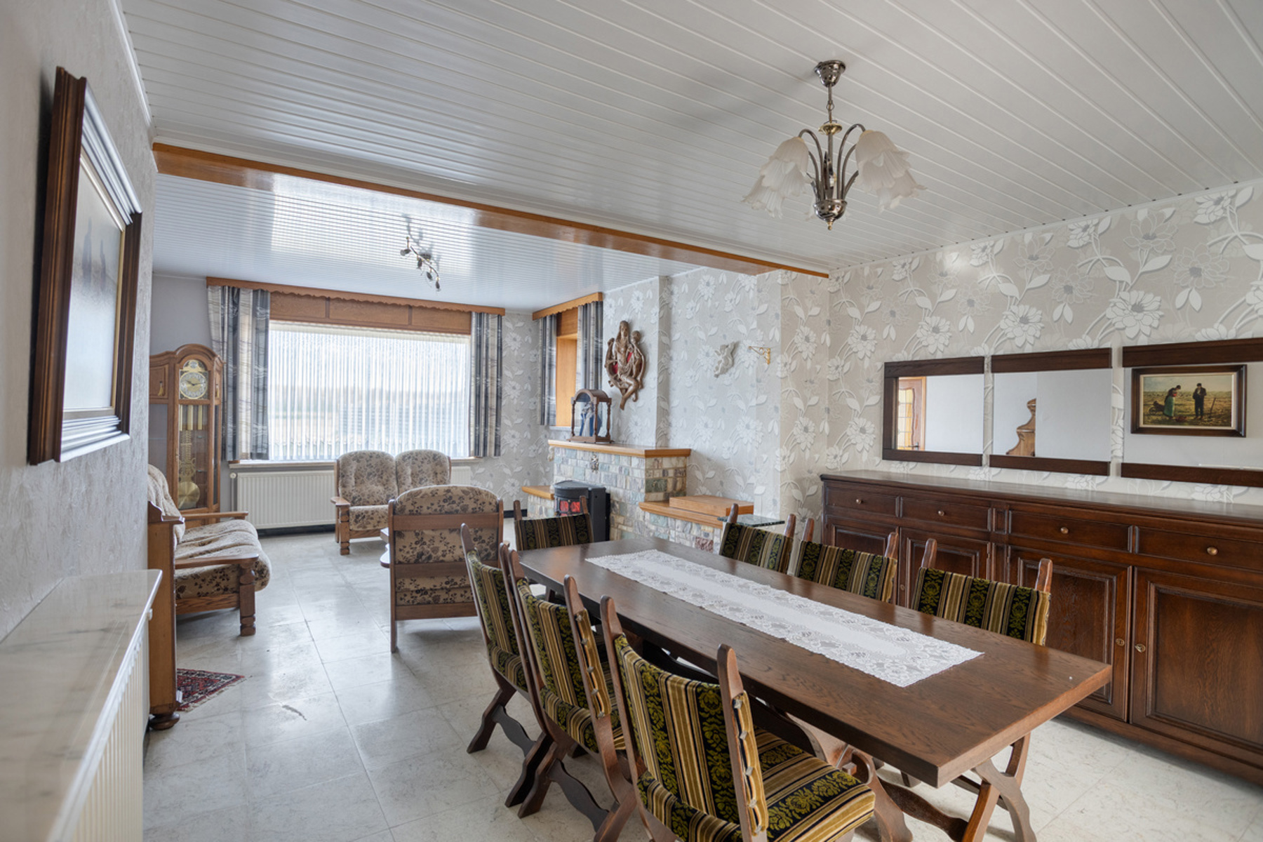 Karaktervolle open bebouwing met zonnige tuin en renovatiepotentieel - foto 5