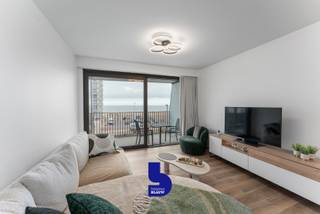 In het prestigieuze gebouw The Crystal Residence in de Troonstraat 226 te Oostende bevindt zich dit modern en luxueus afgewerkt appartement met prachtig zeezicht. Gelegen op de derde verdieping van deze recente residentie combineert dit appartement hedendaagse elegantie met een unieke kustervaring, vlak bij de zeedijk, het centrum, winkels en openbaar vervoer.<br /><br />Het appartement beschikt over een ruime, lichtrijke leefruimte met toegang tot het grote terras, waar je kan genieten van een schitterend uitzicht op zee. De open, volledig ingerichte keuken is uitgerust met moderne toestellen en vormt samen met de woonkamer een aangename leefruimte. Vanuit zowel de leefruimte als de slaapkamer heb je rechtstreeks zicht op zee.<br /><br />De slaapkamer biedt eveneens toegang tot het terras. Indien gewenst kan kan er een extra slaaphoek gemaakt worden.<br />Verder is er een stijlvolle badkamer met inloopdouche en lavabo, een apart toilet en een praktische technische berging.<br /><br />Het gebouw beschikt over een gemeenschappelijk zwembad, een extra troef voor wie houdt van ontspanning en comfort.<br /><br />Belangrijkste troeven:
<ul>
	<li>Terras met frontaal zeezicht</li>
	<li>Hedendaagse, instapklare afwerking</li>
	<li>Centrale ligging nabij dijk en centrum</li>
	<li>Mogelijkheid tot aankoop van een parkeerplaats in de residentie</li>
	<li>Praktisch:</li>
	<li>Bewoonbare oppervlakte: 64 m² + terras</li>
	<li>EPC: 105 kWh/(m² jaar) </li>
	<li>Verkoop onder BTW-stelsel in volle eigendom</li>
	<li>Een stijlvol appartement dat luxe, rust en zeezicht perfect weet te combineren.</li>
</ul>