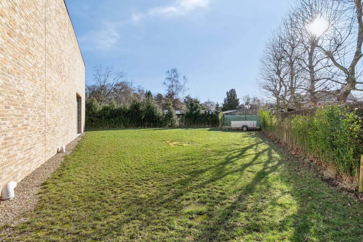 Bedrijfsgebouw met bouwgrond te koop in Laarne - foto 5