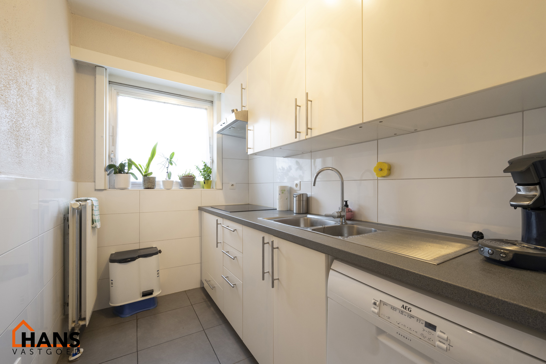 Recent gerenoveerd gelijkvloerappartement met stadstuin. - foto 4