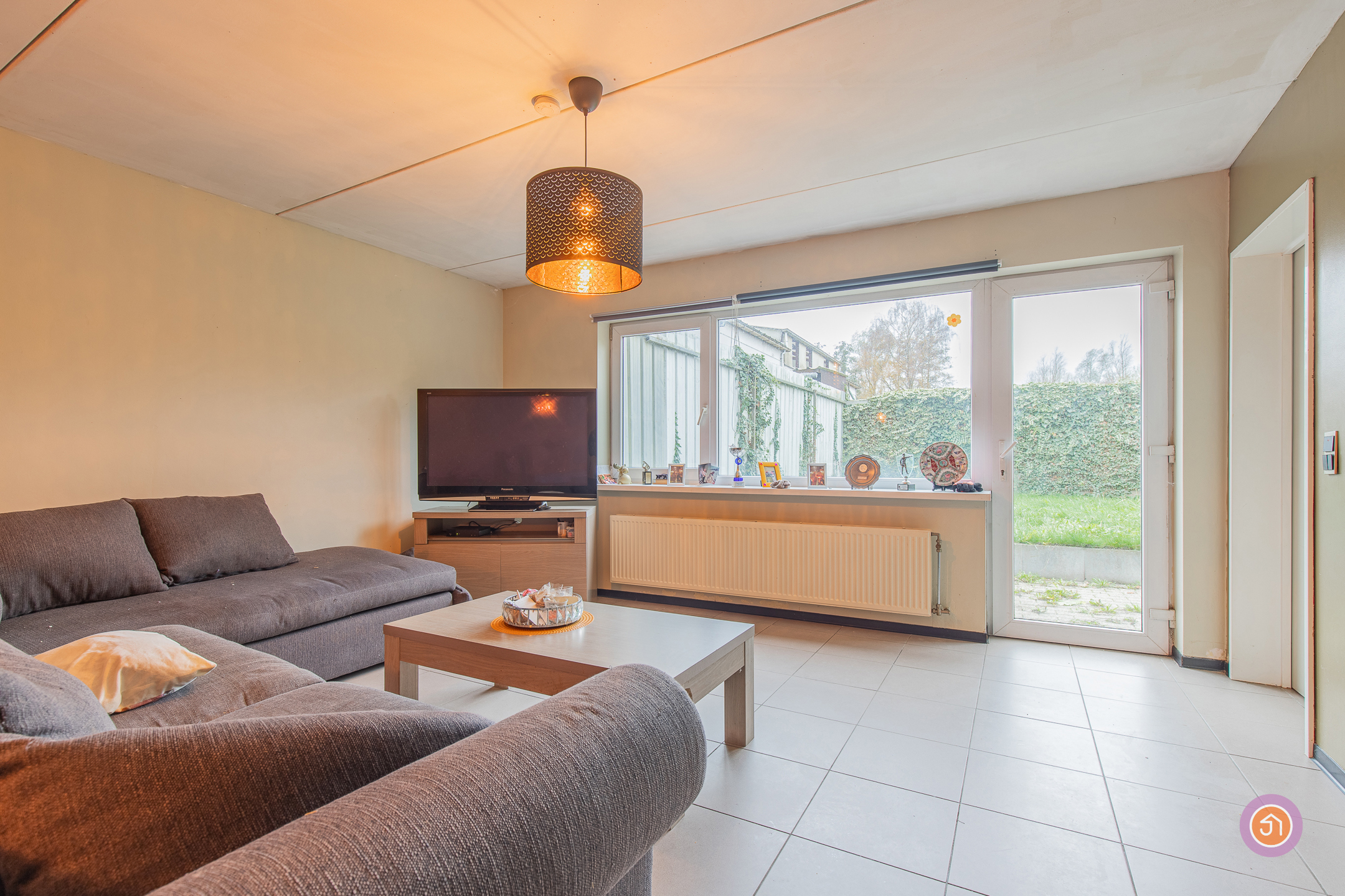 Gelijkvloers appartement met tuin - foto 1