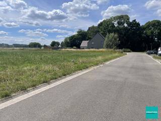 Dans un lotissement verdoyant et calme à Merchtem, situé dans l'Appelkotlaan, nous vous proposons ce spacieux terrain à bâtir de 12a 95ca (LOT...