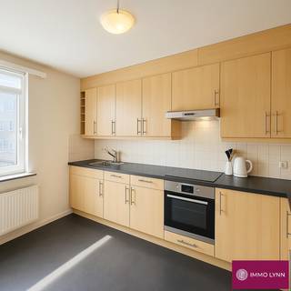 Renovated apartment with 2 rooms close to the NATO headquarters! Layout: entrance hall, living room, kitchen, storage room, 2 bedrooms,...