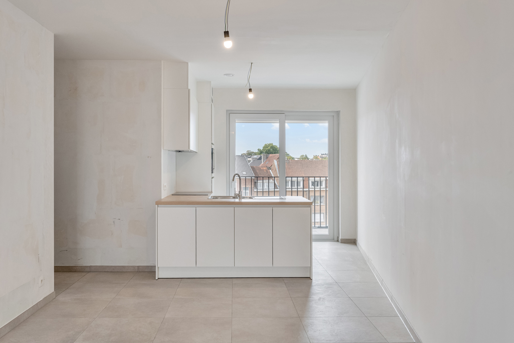 Nieuwbouwappartement met 2 slpks + terras - foto 2