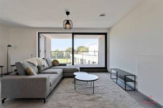 Lichtrijk 2 slaapkamerappartement met terras te AnzegemDit prachtig appartement is centraal gelegen in Anzegem, in de buurt van supermarkten,...