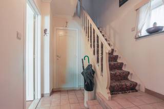 Te moderniseren woning  met 3 slaapkamers, bureau, garage en grote tuin (totale grondoppervlakte 308m²).