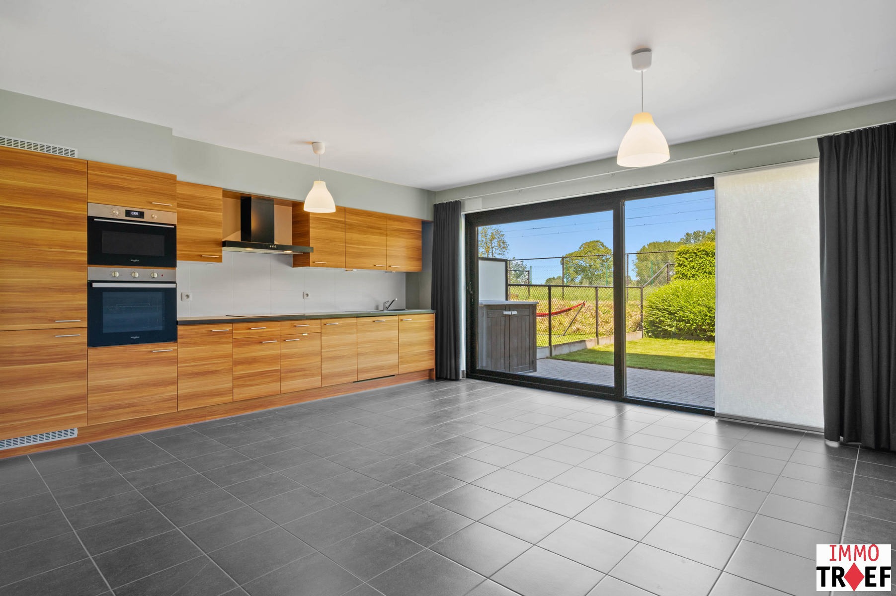 Energiezuinig gelijkvloers appartement met tuin & garagebox - foto 4