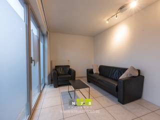 OPBRENGSTEIGENDOM BESTAANDE UIT HANDELSGELIJKVLOERS EN APPARTEMENT OP EEN PERCEEL VAN 03A22CA TE OUDSBERGENTROEVEN- Centrale ligging. Alle...