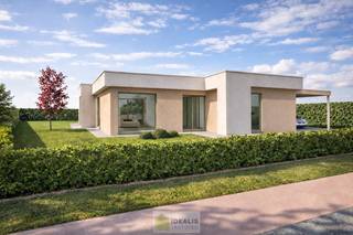 <strong>IDEALIS VASTGOED – Schitterend volledig vernieuwde woning met een heerlijke open leefruimte, luxe keuken, 3 ruime slaapkamers, een ruime luxueuze badkamer én een praktische wasplaats! Dit heerlijke huis, dewelke ook voorzien is van 2 autostaanplaatsen waarvan 1 overdekt, bevindt zich op een perceel van +-12a 58ca vlakbij het centrum van Hamont-Achel, op slechts enkele minuten van de Nederlandse grens - EEN MUST VISIT! -<br /><br />LIGGING: </strong><br />Deze woning bevindt zich op wandelafstand van de stadskern van Hamont-Achel. De woning is gelegen in een rustige en aangename woonstraat. De centrale ligging biedt een vlotte bereikbaarheid van scholen, supermarkten en andere commerciële gelegenheden. Tevens is de Nederlandse grens op slecht 2 minuten bereikbaar!!<br /><br /><strong>INDELING:<br />Gelijkvloers:</strong><br />- Inkomhal – een indrukwekkend mooie open leefruimte voorzien van een lichtrijke woonkamer met zit- en eetgedeelte en met als kloppend hart een heerlijke keuken met bargedeelte en voorzien van alle comfort – achterinkom/wasplaats – toilet – nachthal – slaapkamer 1 met ensuite dressing – slaapkamer 2 – badkamer voorzien van ligbad, inloopdouche, toilet en dubbele lavabo – slaapkamer 3 -<br /><br /><strong>Tuin: </strong><br />- Westgeoriënteerd – verharde oprit – terras – carport – (zwembad en poolhouse vergund, worden niet uitgevoerd)<br /><br /><strong>BIJZONDERHEDEN:</strong><br />- Volledig vernieuwde woning<br />- Alles op gelijkvloers!<br />- Wat werd vernieuwd?: dak, dakisolatie, gevelisolatie, vernieuwde technieken en leidingwerk, stucwerk, schrijnwerk, keuken, badkamer, vloeren, binnendeuren, …<br />- Volledige woning in grondlaag/fixatielaag aangebracht<br />- Toffe indeling<br />- Gunstig EPC, extra goed geïsoleerd, GEEN renovatieverplichting!<br />- Elektrische installatie conform!<br />- Dé ideale ligging, pal bij het centrum en voorzieningen, op slechts enkele minuten van de NL-grens<br />- Na oplevering instapklaar!<br /><br /><strong>EPC: </strong>124kWh/m² jaar<br /><br /><strong>O-peil: </strong>niet overstromingsgevoelig<br />P-score: A<br />G-score: A<br /><br /><strong>Benieuwd naar deze woning? Ons IDEALIS Team geeft U met plezier en steeds vrijblijvend de nodige informatie via e-mail, ter plaatse of op ons kantoor Pelt.<br />Wenst U advies omtrent uw eigen woning? Graag plannen wij vrijblijvend met U een afspraak in om onze expertise met U te delen, steeds tot Uw dienst!!<br />Neem contact op met IDEALIS VASTGOED op 011/515 565 of mail naar info@idealisvastgoed.be!</strong><br /><br /><strong>Stedenbouwkundige Inlichtingen:</strong><br />Bouwvergunning - Woongebied - Geen dagvaarding - Geen voorkooprecht – Geen verkavelingsvoorschriften