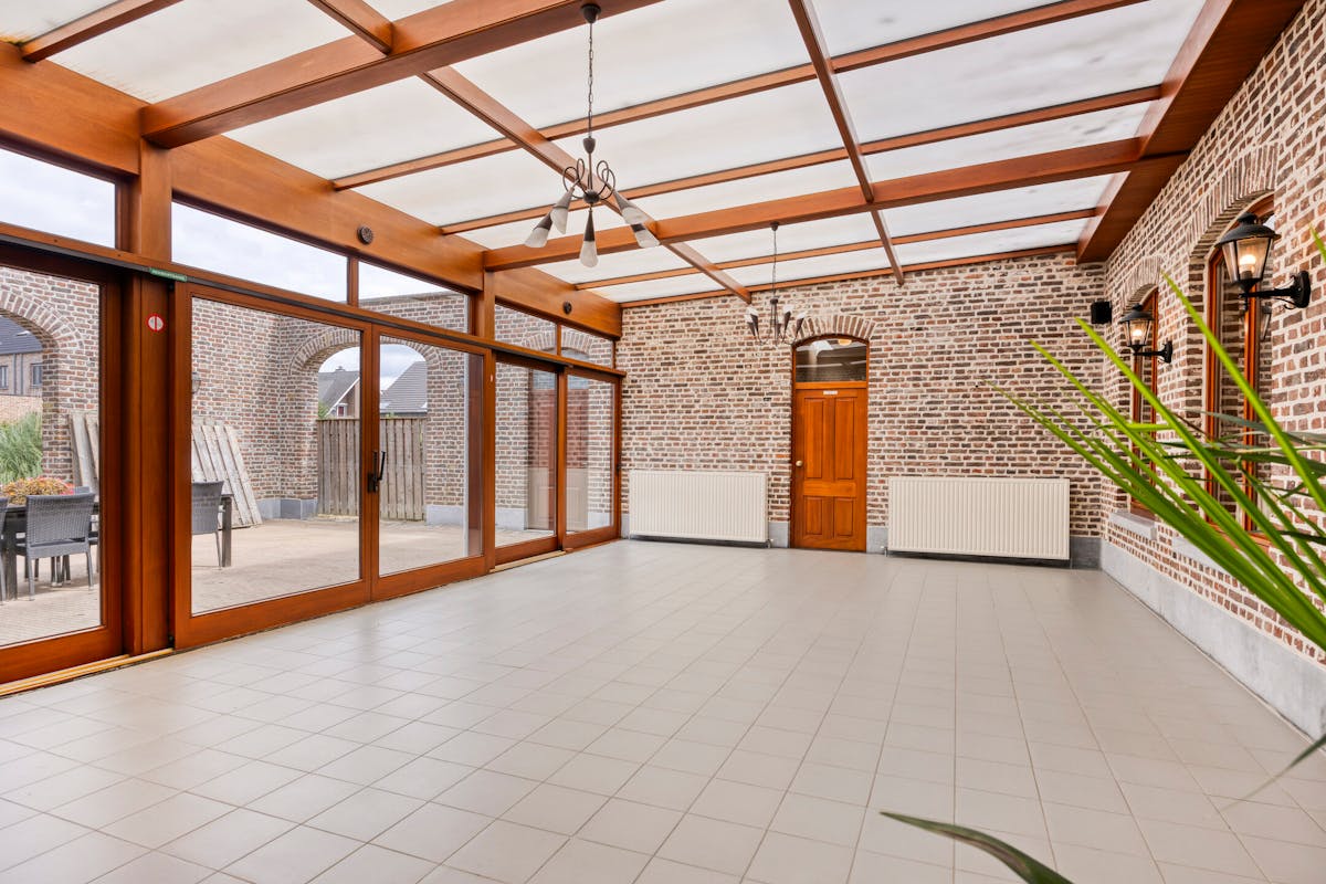 Handelshuis met café en feestzaal + bouwgrond te koop in Tongerlo - foto 5