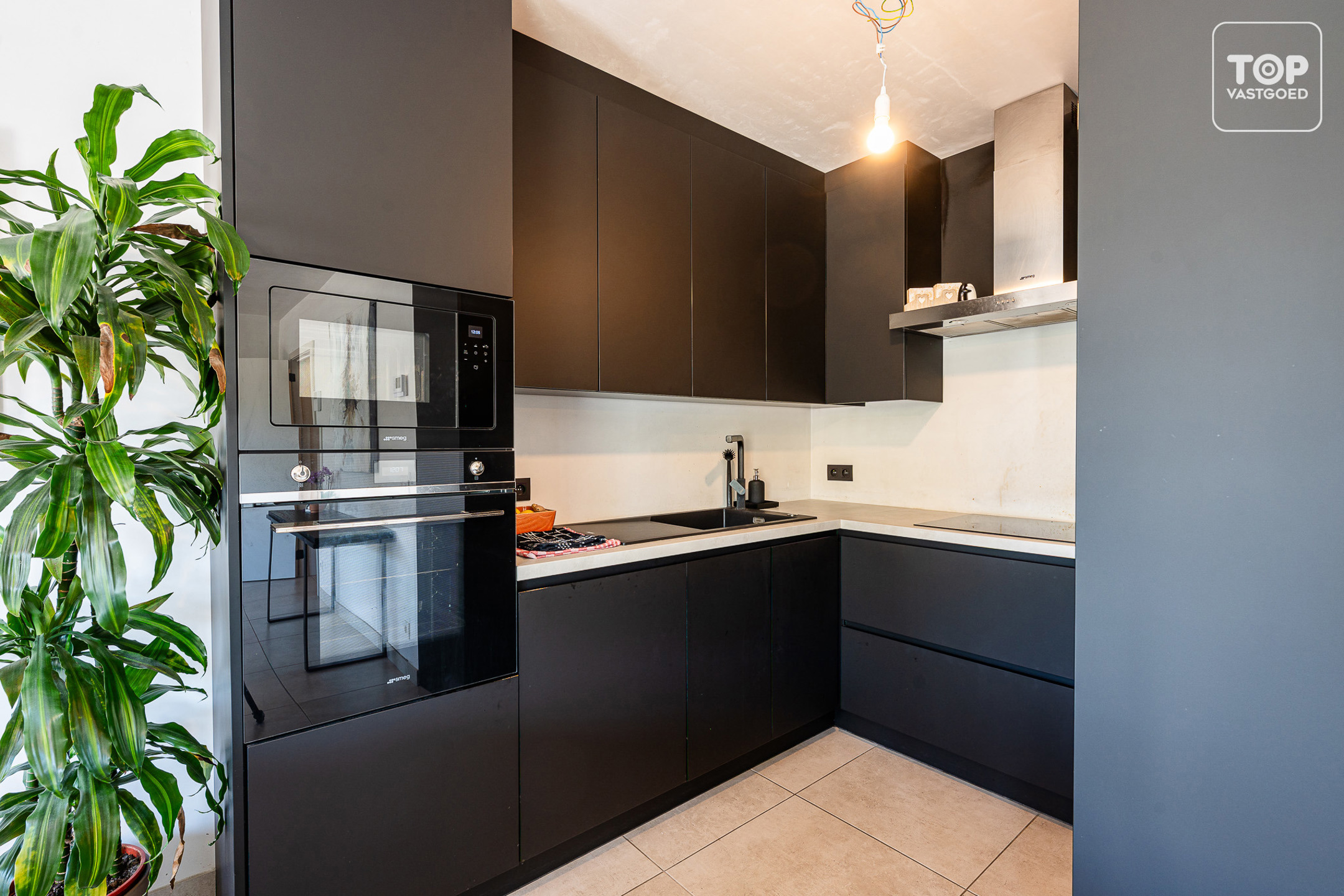 Gelijkvloers appartement met garage en zonnige tuin. - foto 5