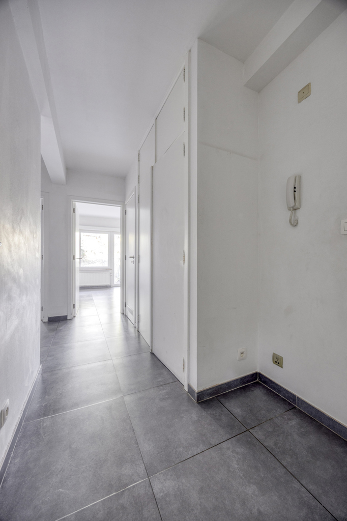 Instapklaar gelijkvloers appartement met eigen tuin - foto 4