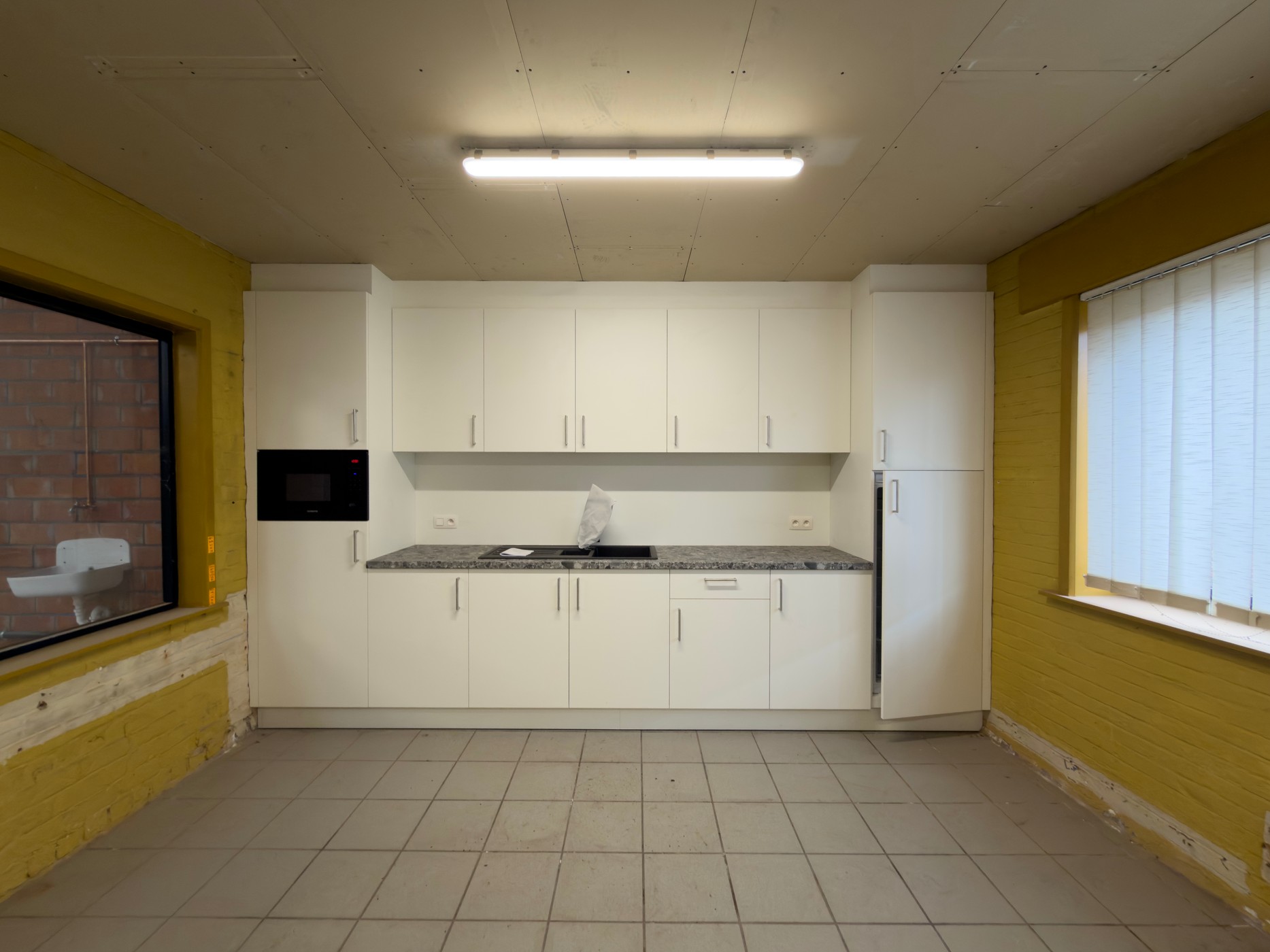 Magazijn (750m²) met kantoor (50m²) te huur in Deinze - photo 5