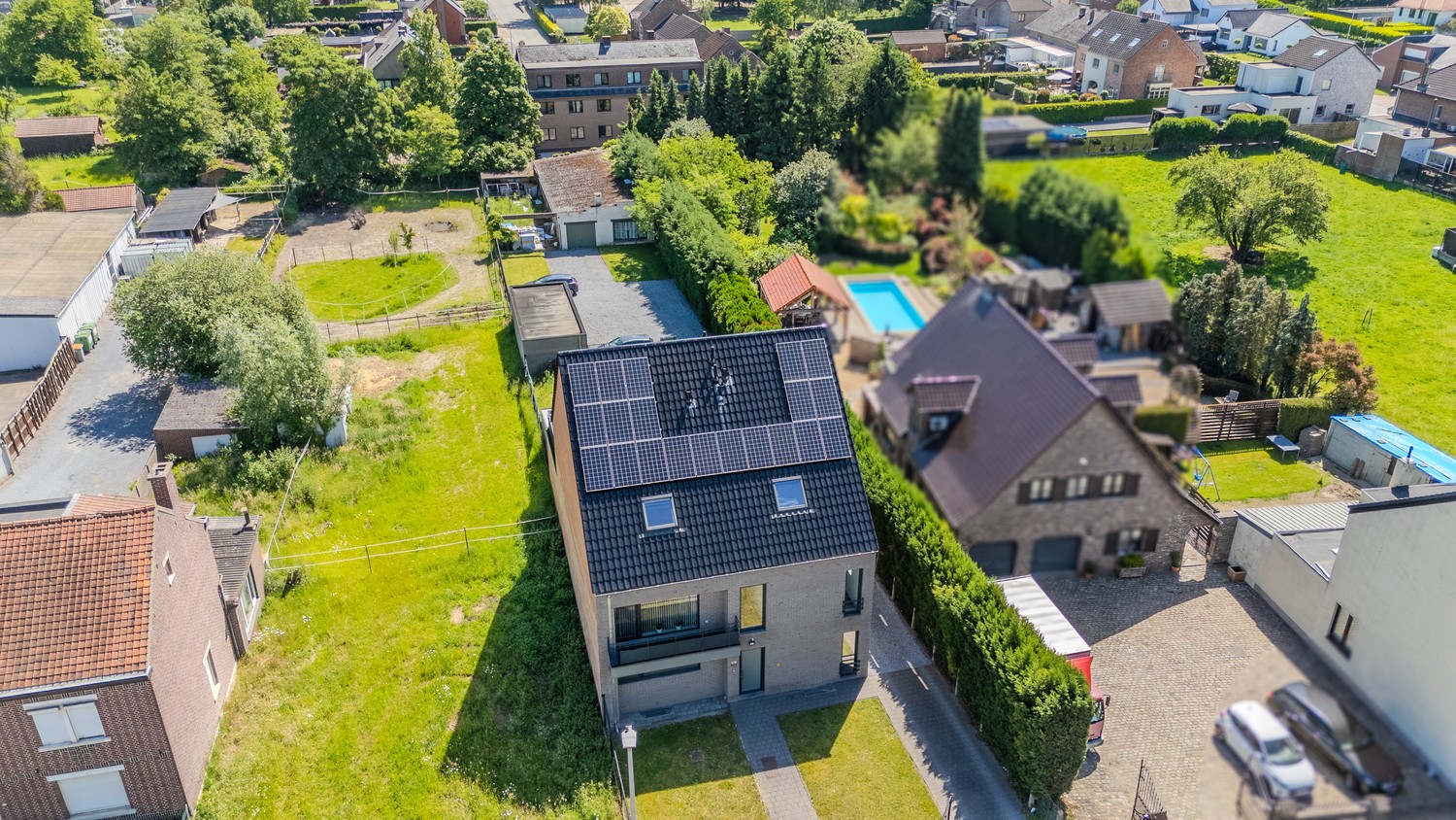 Ruim duplex-appartement met twee slaapkamers, terras en autostaanplaats in Neerharen-Lanaken - foto 4