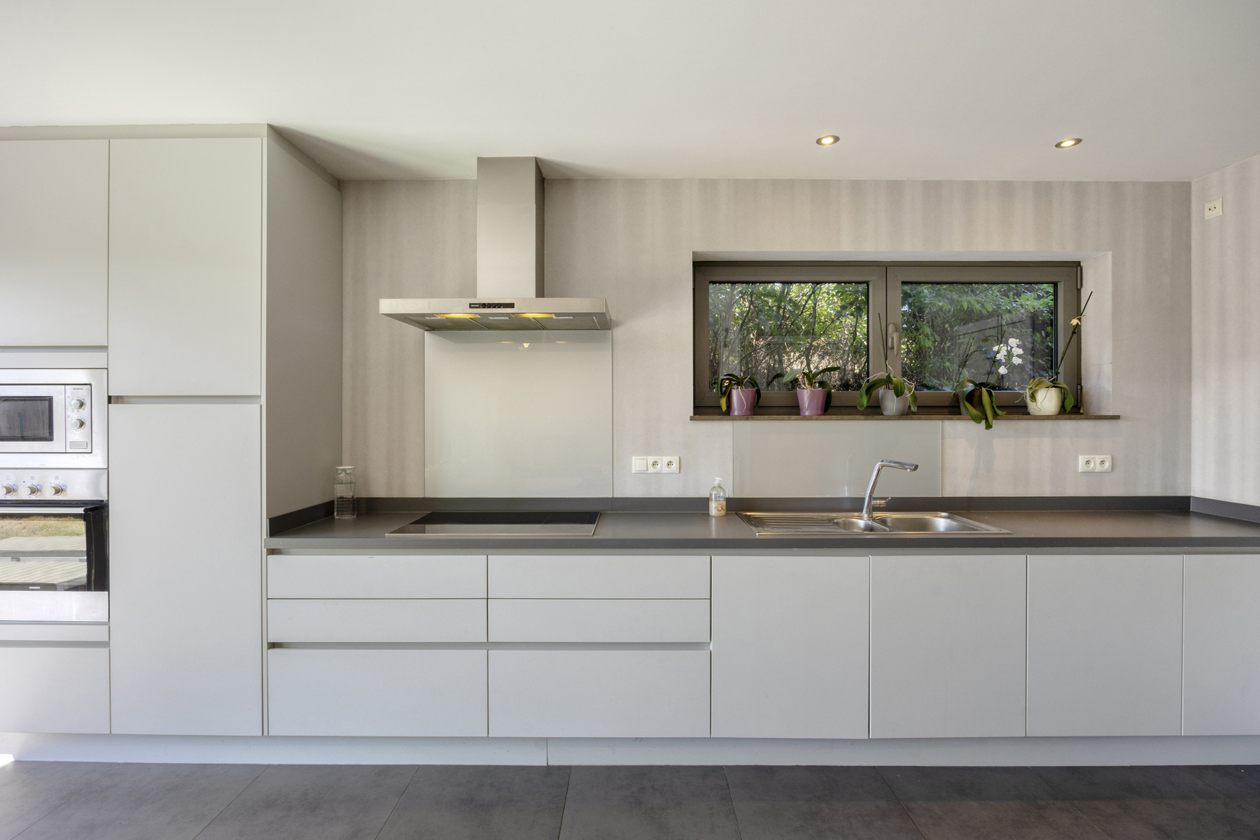 Instapklare HOB met 5 kamers + bureau, en aangename tuin! - foto 4